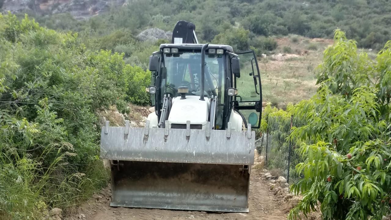 Yenişehir Belediyesi yol yapım çalışmalarına kırsalda da devam ediyor 